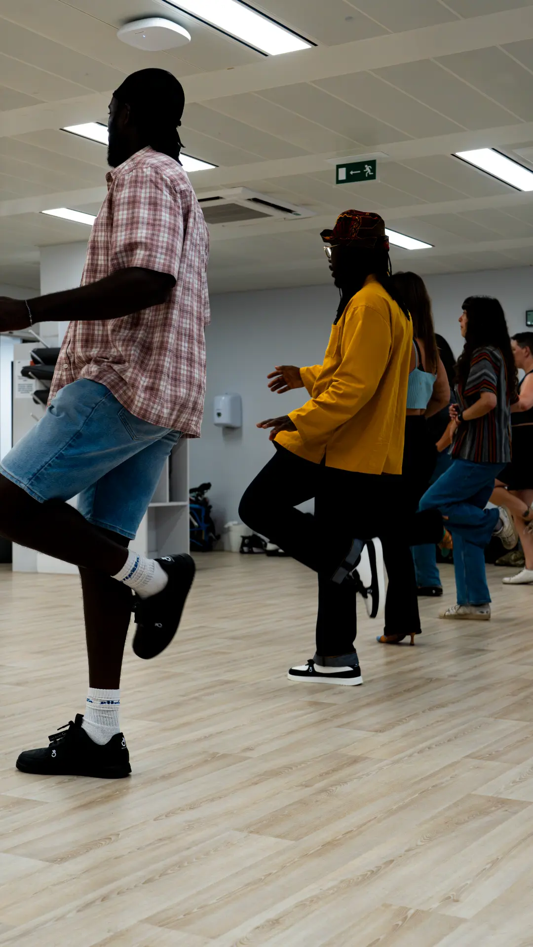 Beginners learning salsa footwork in a This Is Salsa class